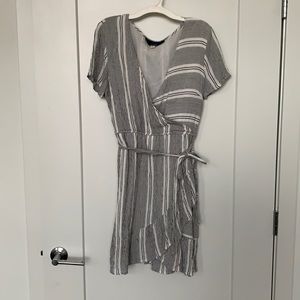 Black and white wrap-around dress.